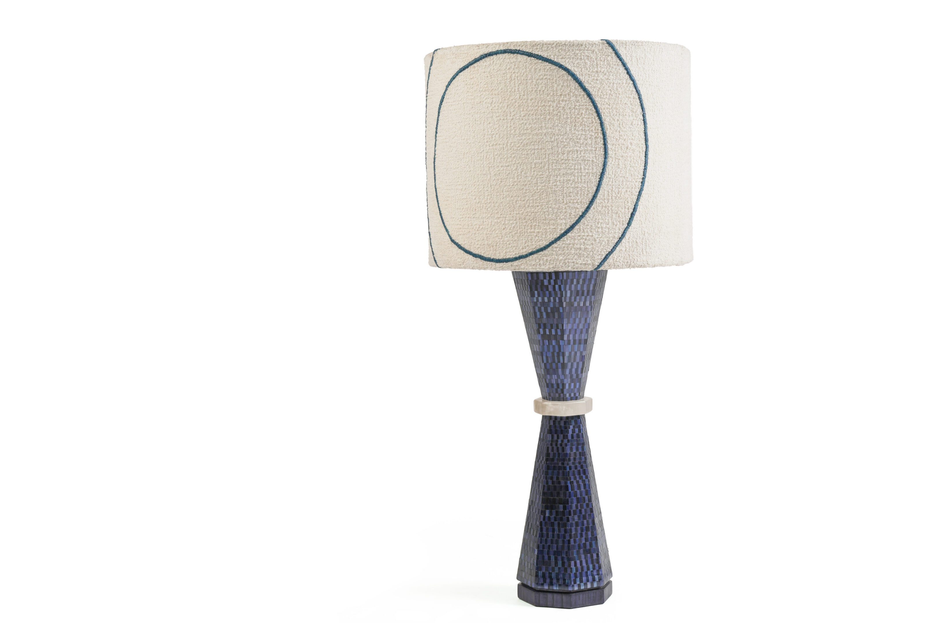 Blue hourglass lamp with patterned drum shade