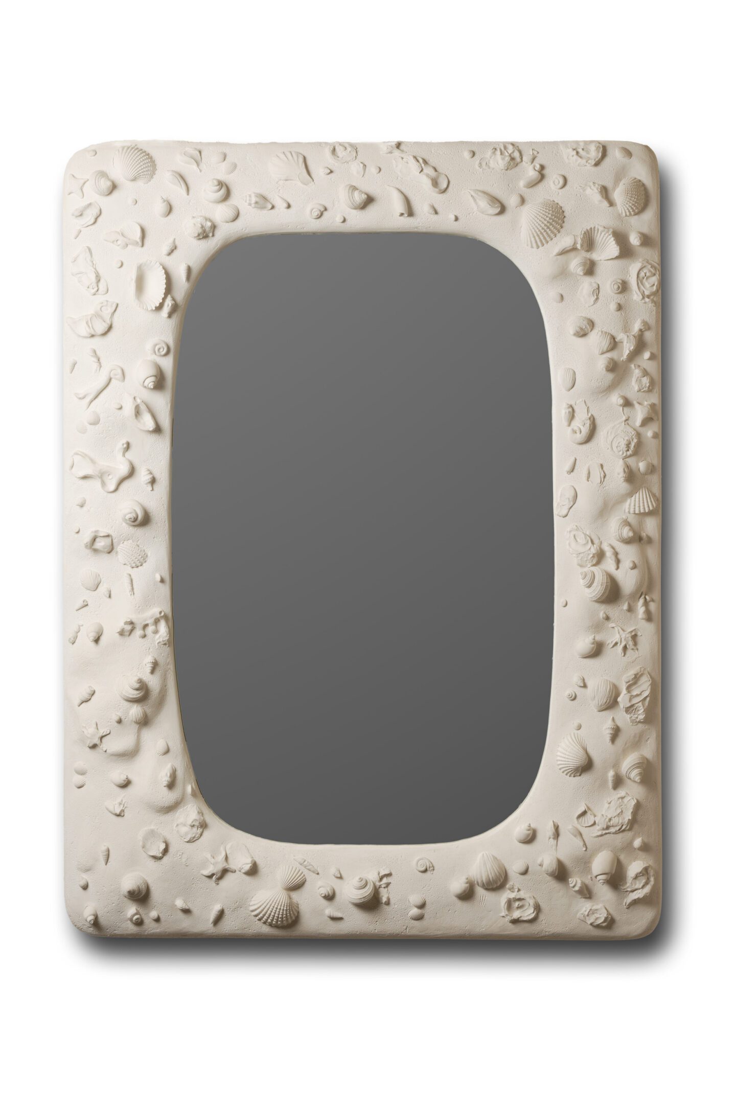 White mirror with seashell-embossed frame