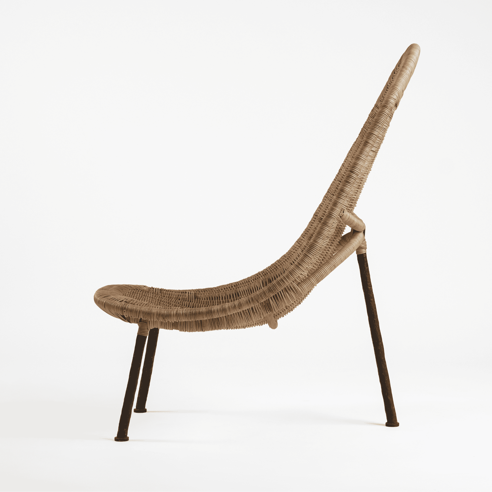 Woven rattan lounge chair with tall curved back