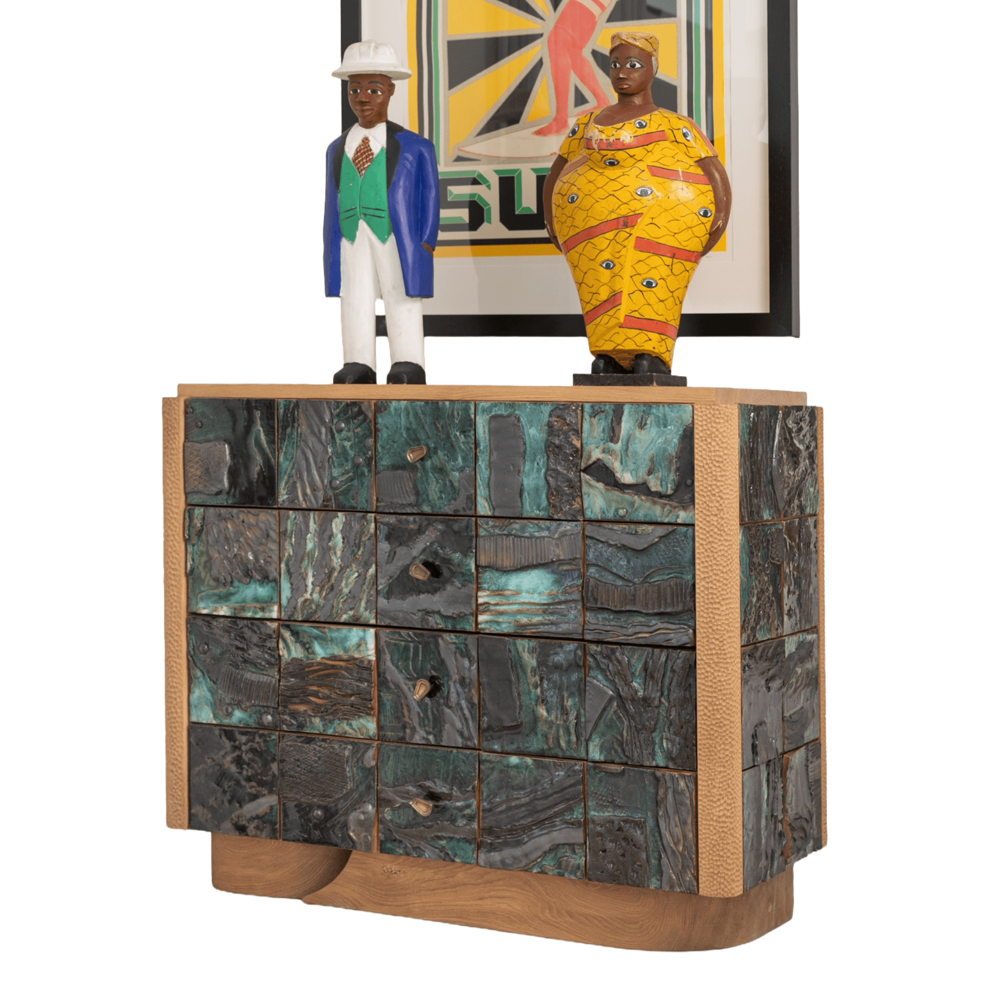 Stone-tiled cabinet topped by two carved figures