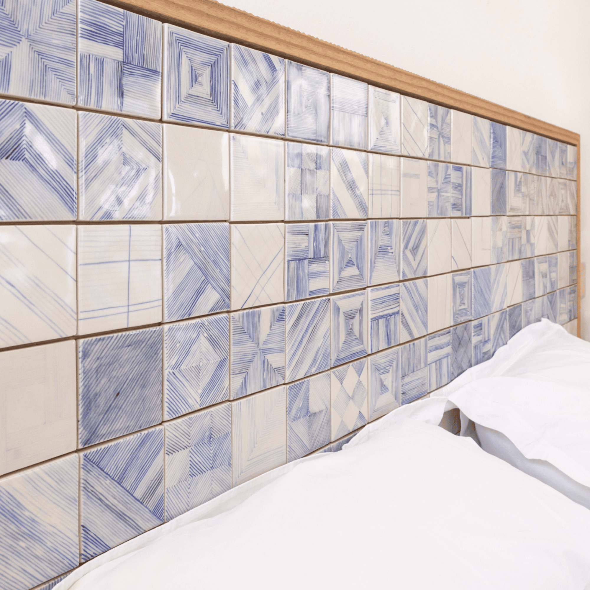 Blue and white tiled headboard
