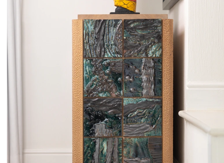 Artistic cabinet with vibrant tiles
