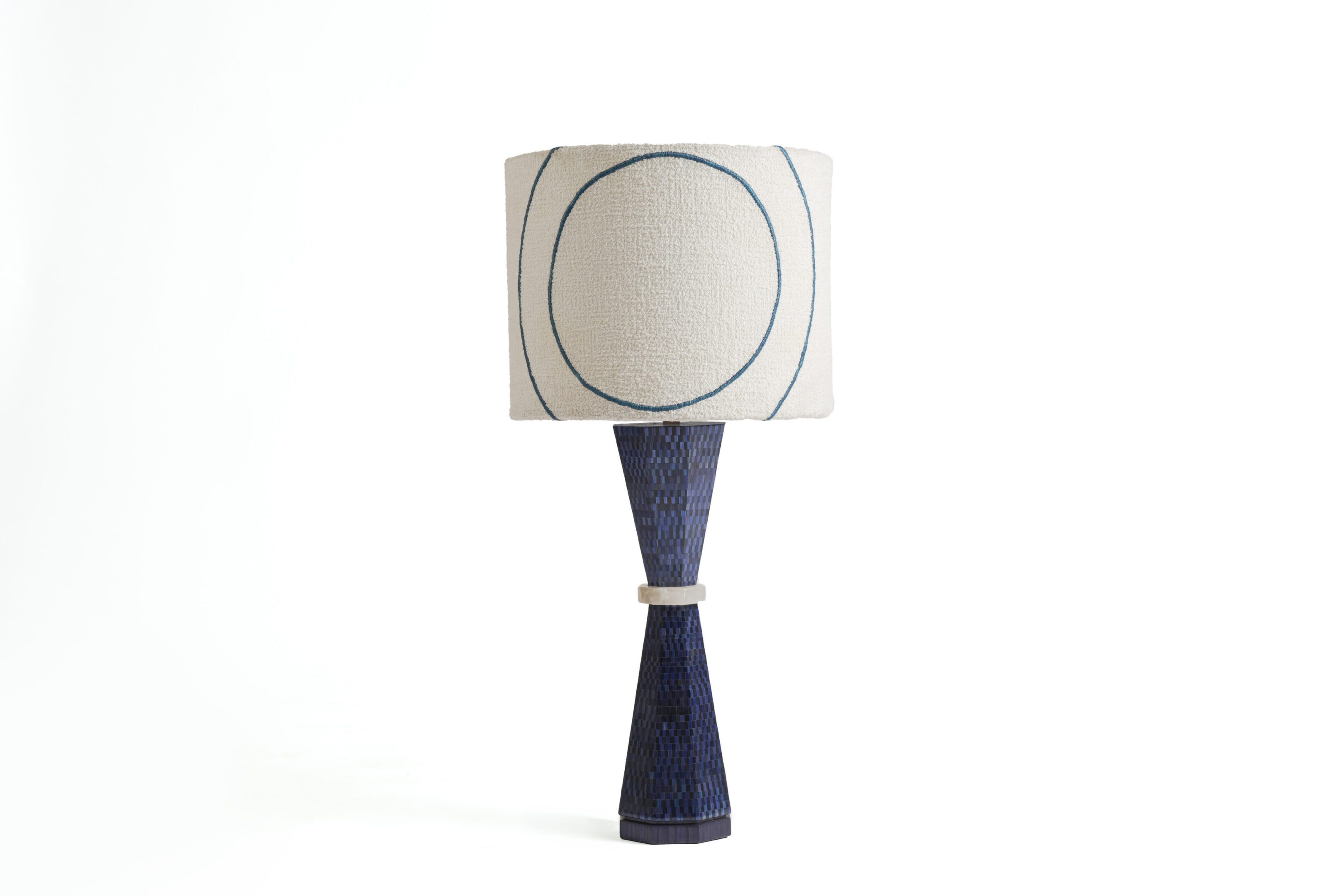 Blue textured table lamp with circular shade